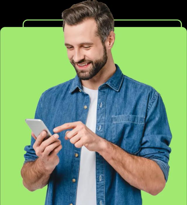 Smiling man holding a smartphone